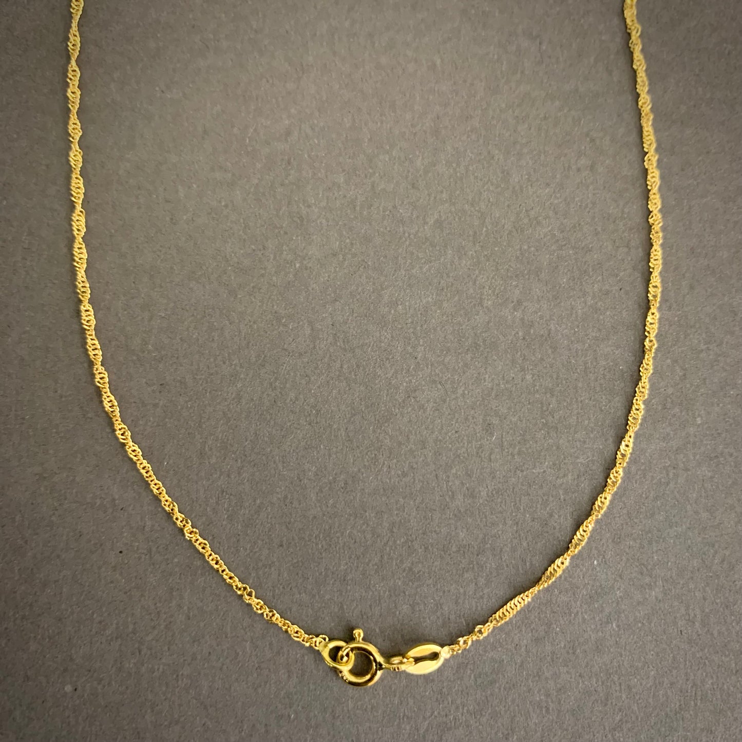 Cadena Singapur 1.57gr / 45cm / 1.3mm Oro Amarillo L750 +2 18K