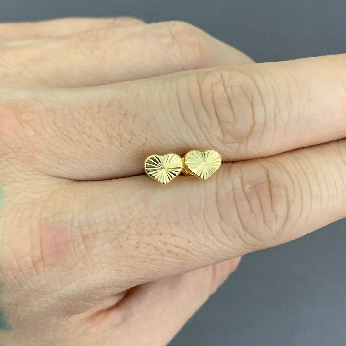 Topos Corazon Diamantado 0.64gr / 5.2mm Oro Amarillo L720 18K