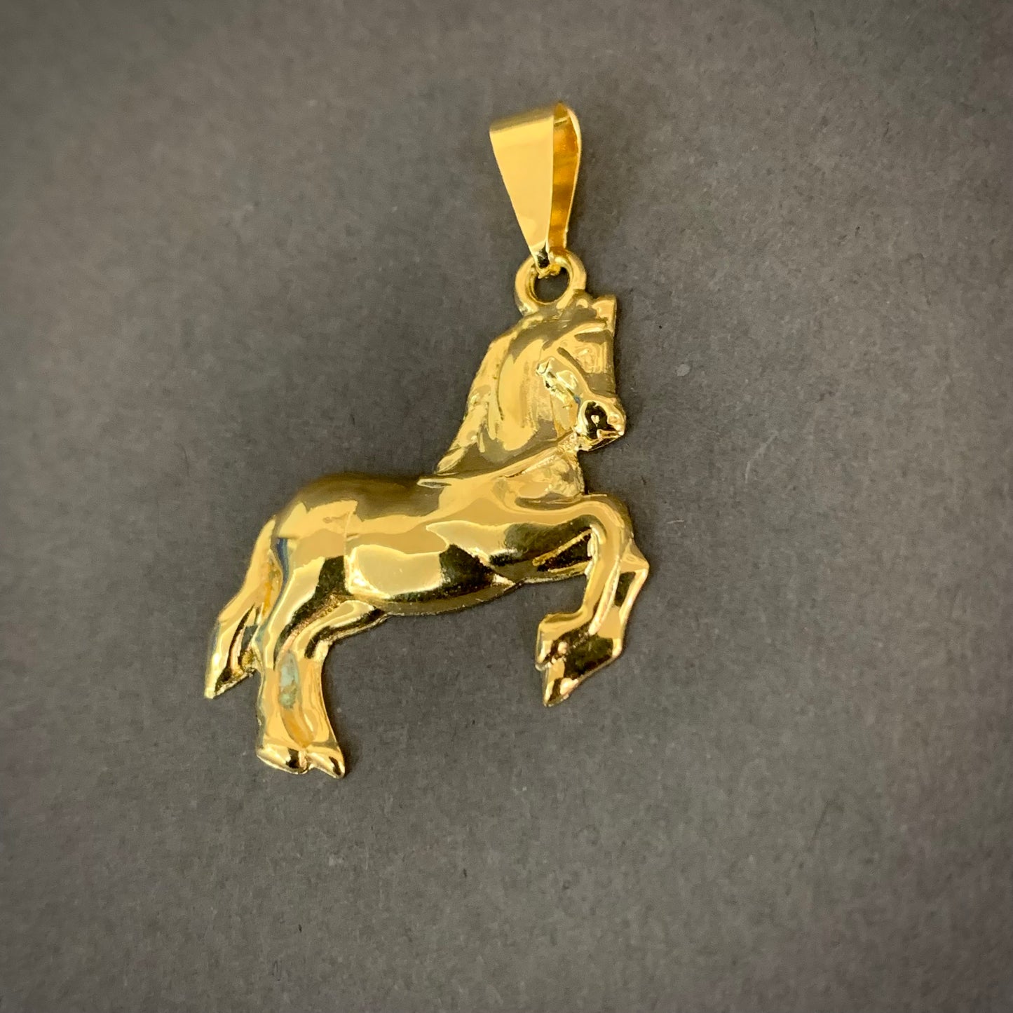 Dije Caballo 1.94gr / 3.4cm / Oro Amarillo L720 18K