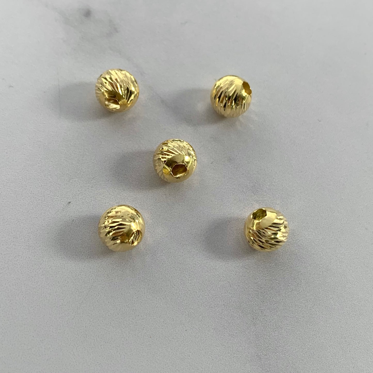 Bola Diamantada 0.6Gr / 8Mm Oro Amarillo L720 18K