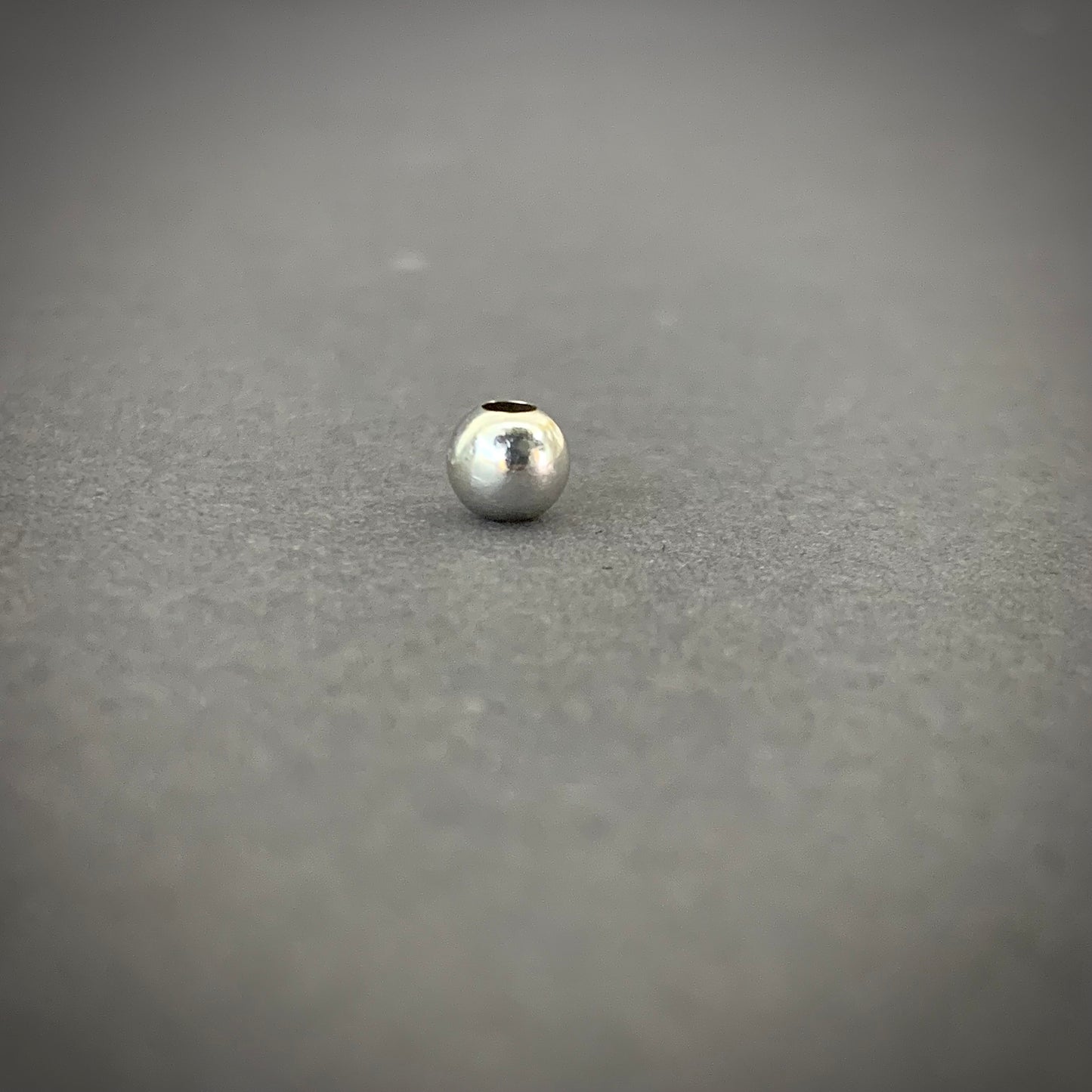 Bola 5mm Lisa 0.15gr / Oro Blanco L720 18K