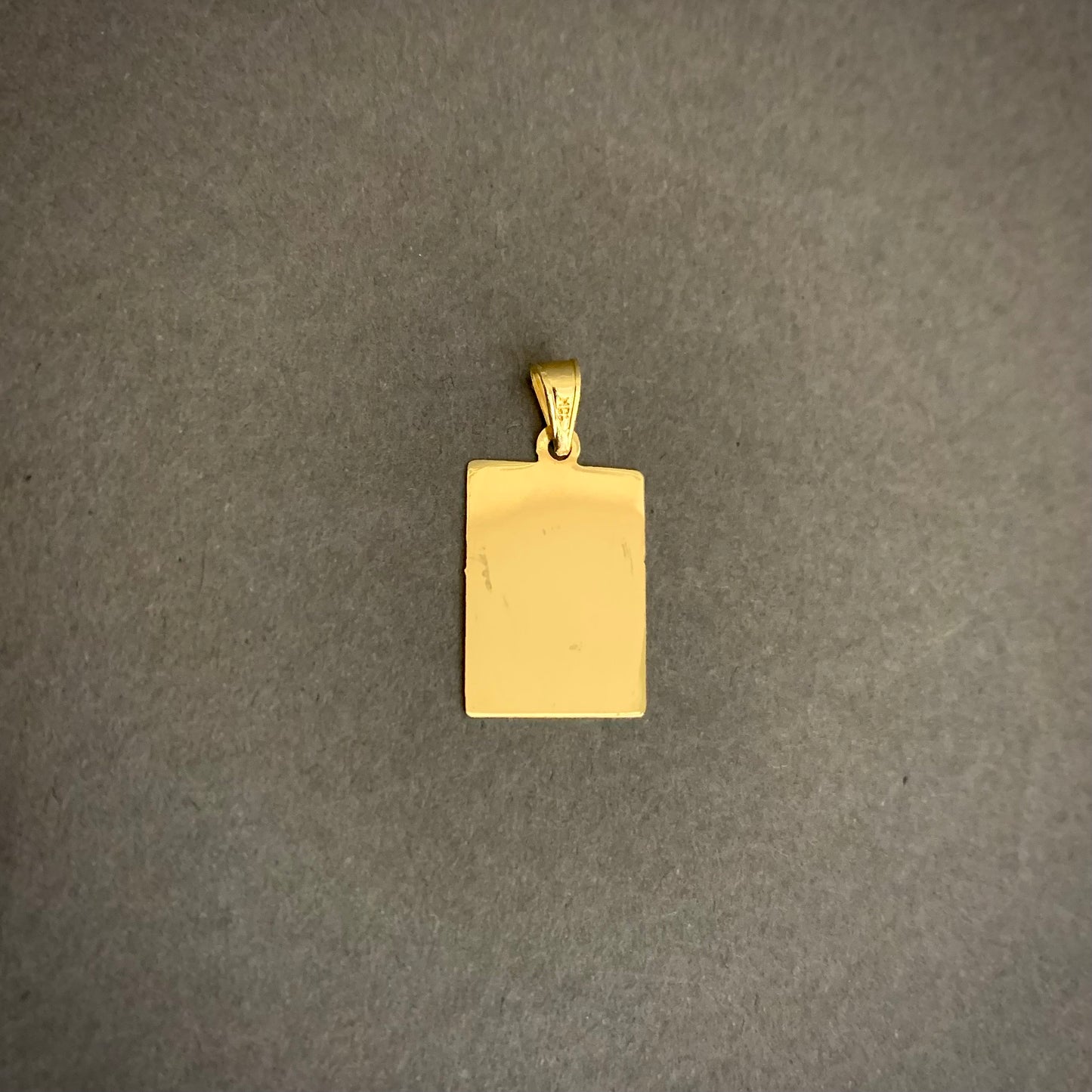 Dije Placa 0.91gr / 2.5cm / Oro Amarillo L720 18K