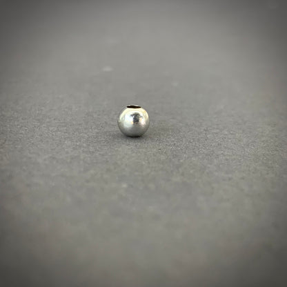 Bola 5mm Lisa 0.15gr / Oro Blanco L720 18K