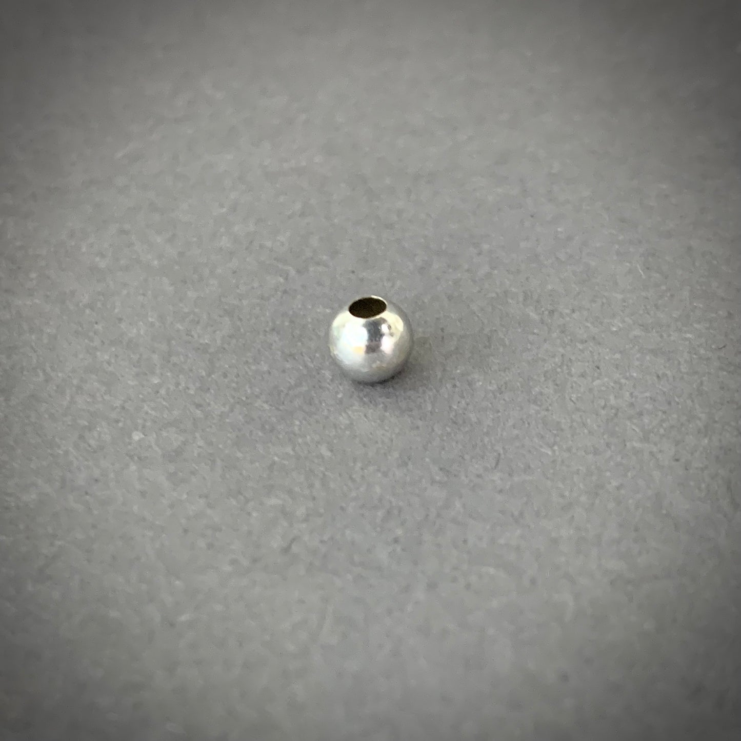 Bola 5mm Lisa 0.15gr / Oro Blanco L720 18K