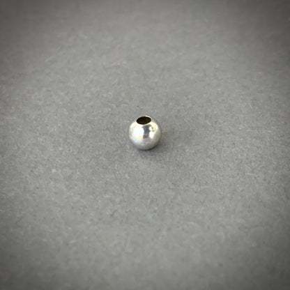 Bola 5mm Lisa 0.15gr / Oro Blanco L720 18K