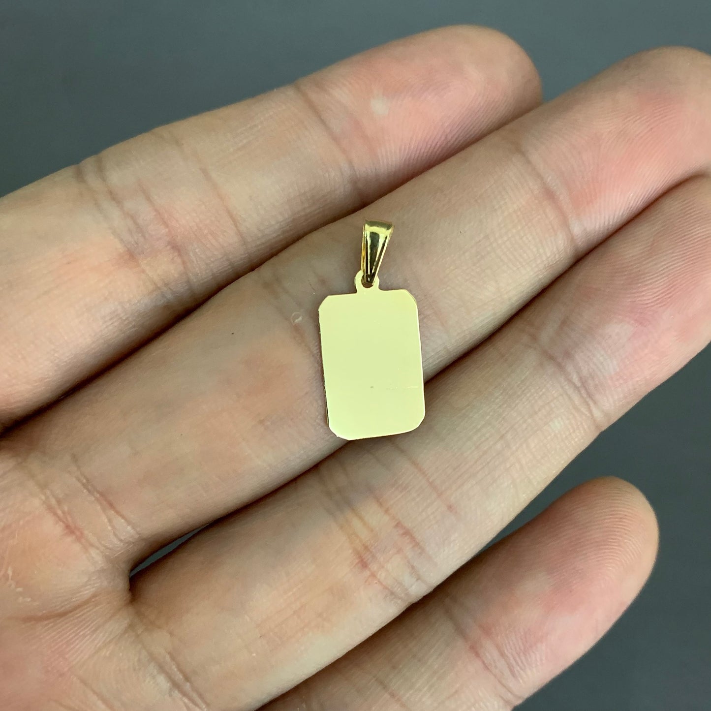 Dije Placa 0.58gr / 2cm / Oro Amarillo L720 18K