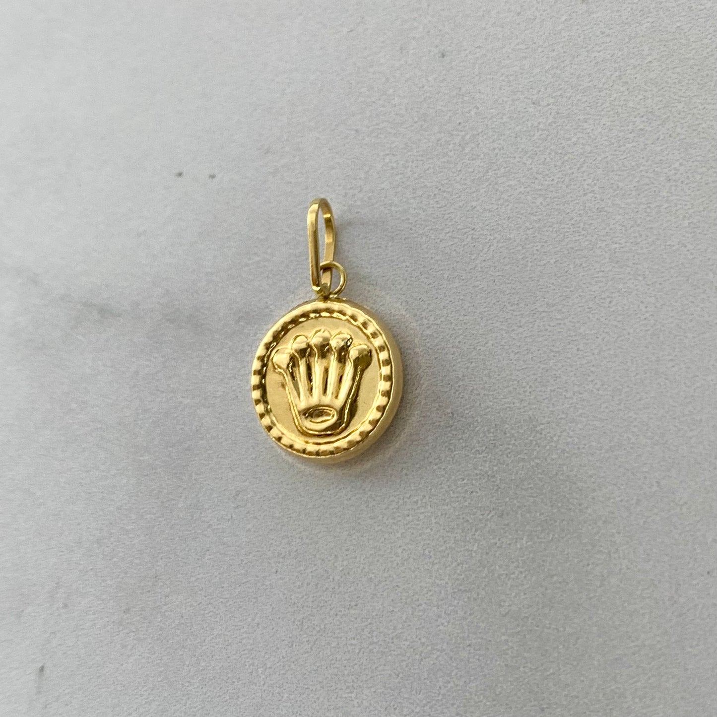 Dije Rx Troquelado 0.6Gr / 20Mm Oro Amarillo L720 18K