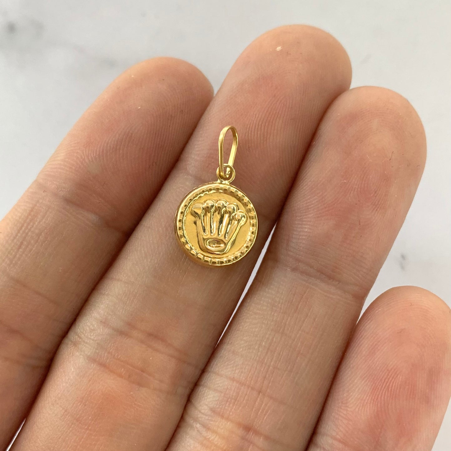 Dije Rx Troquelado 0.6Gr / 20Mm Oro Amarillo L720 18K